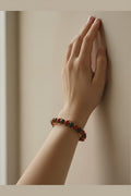 Pulsera alambre dorado con lapislázuli i Jade coral rojo