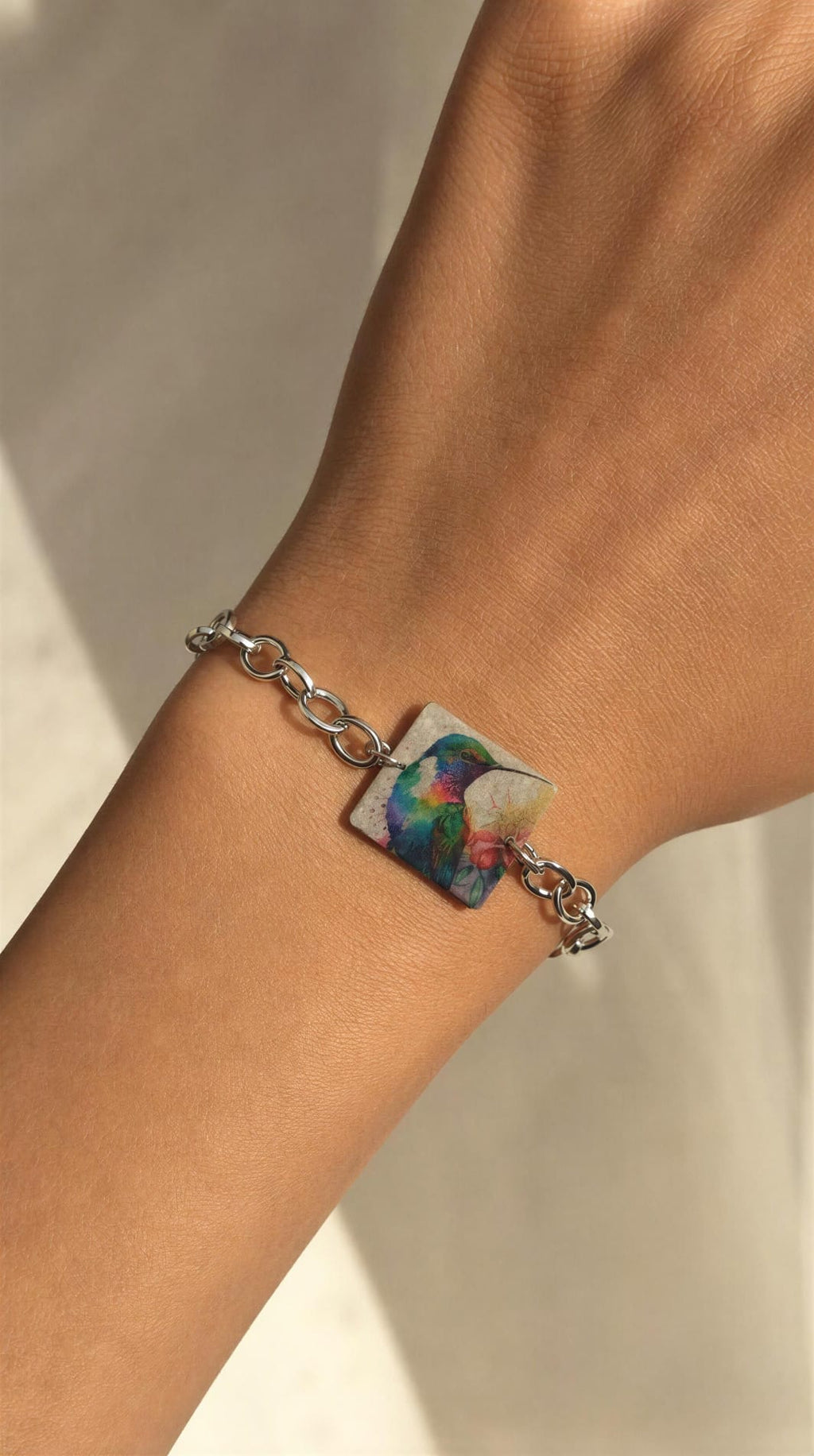 Pulsera colibrí y cadena acero.