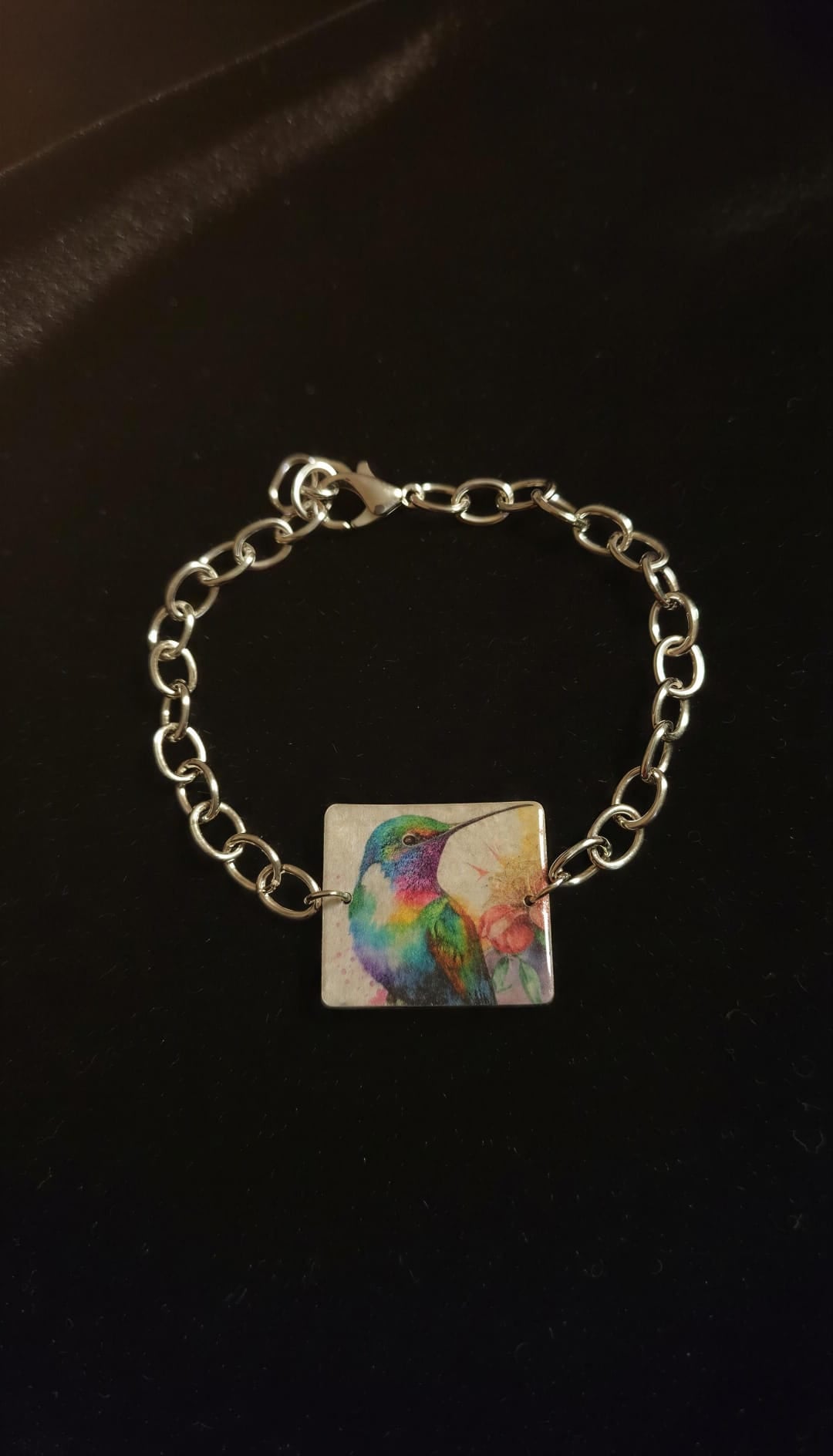 Pulsera colibrí y cadena acero.