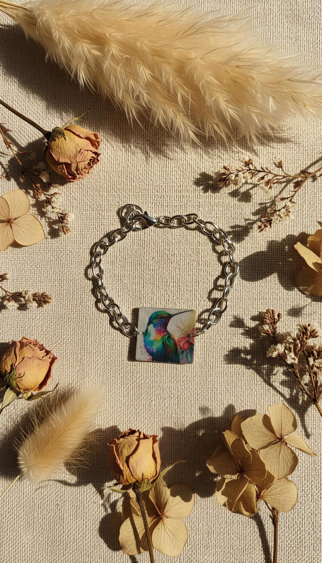 Pulsera colibrí y cadena acero.