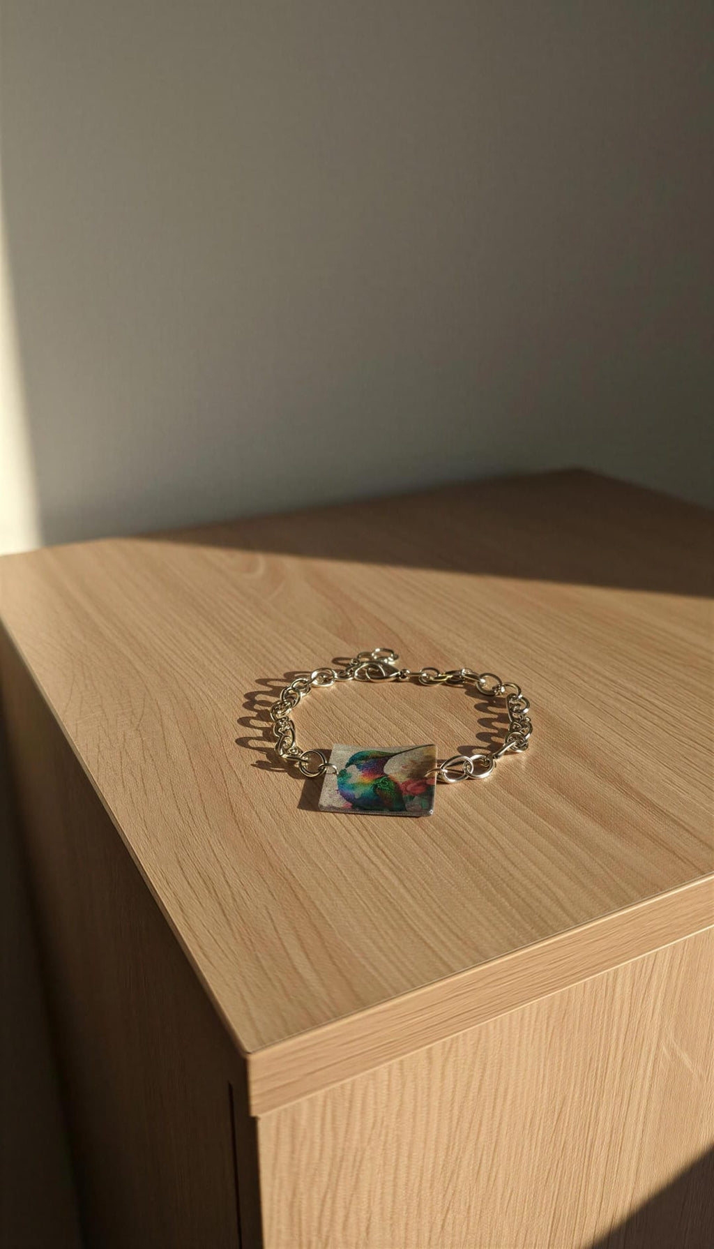 Pulsera colibrí y cadena acero.
