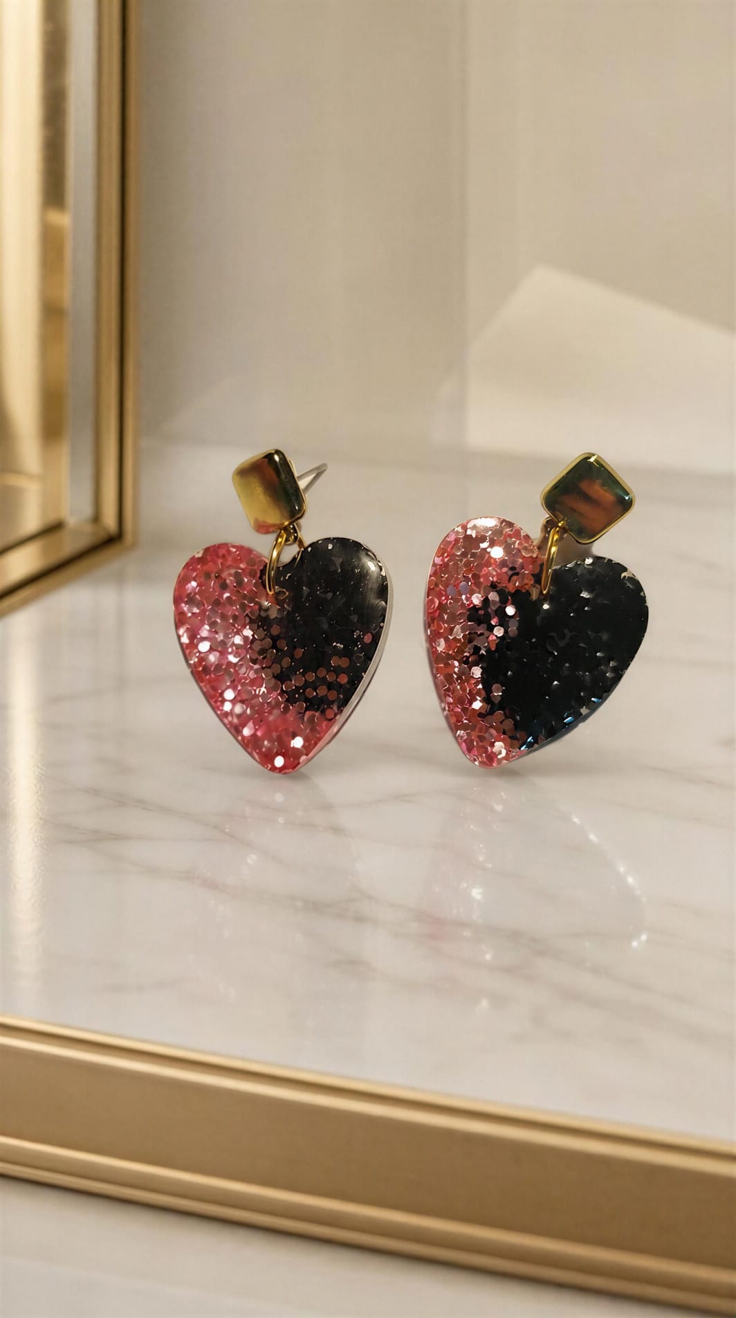 Pendientes de resina en forma de corazón rosa y negro